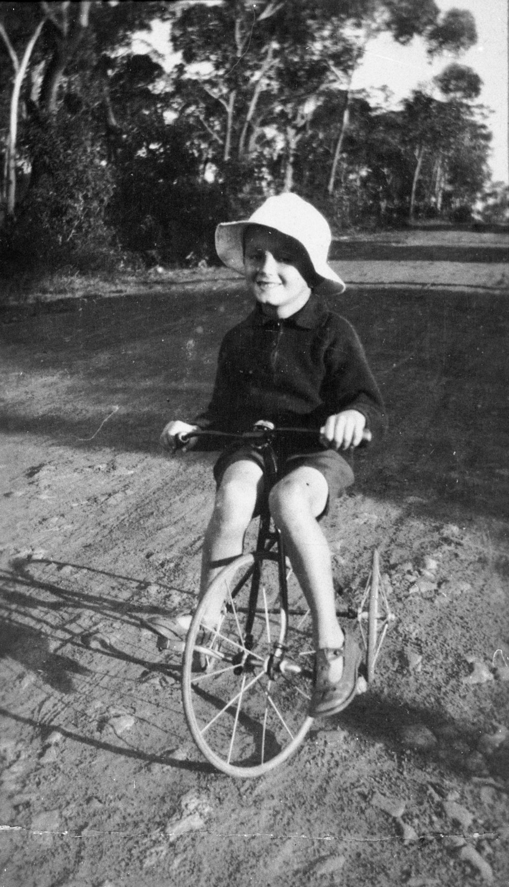 Child on bicycle in Glen Street, Belrose