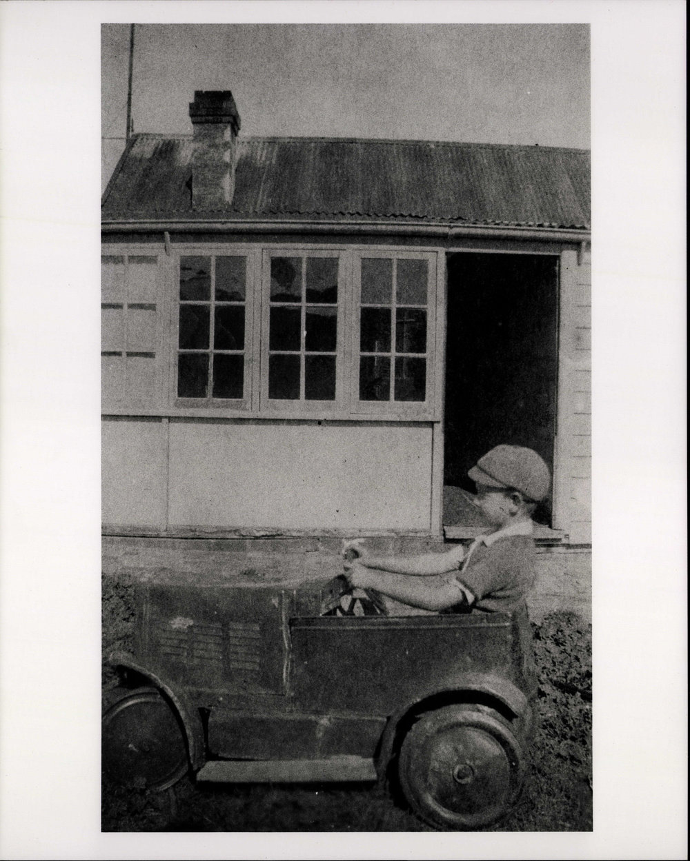 Ron Phillips playing in his Toy car