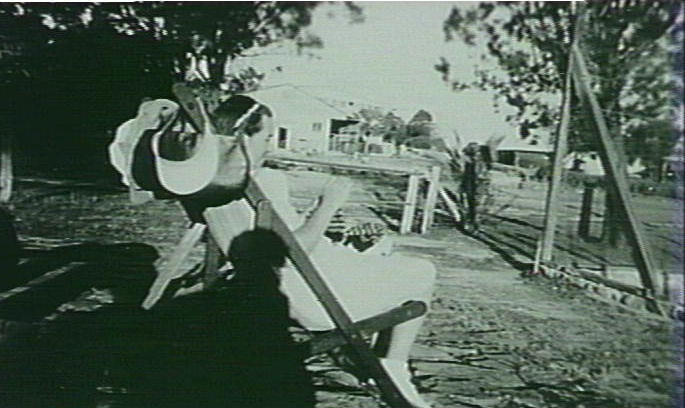 Mrs Fryer at McNeil's tennis courts, Dee Why West