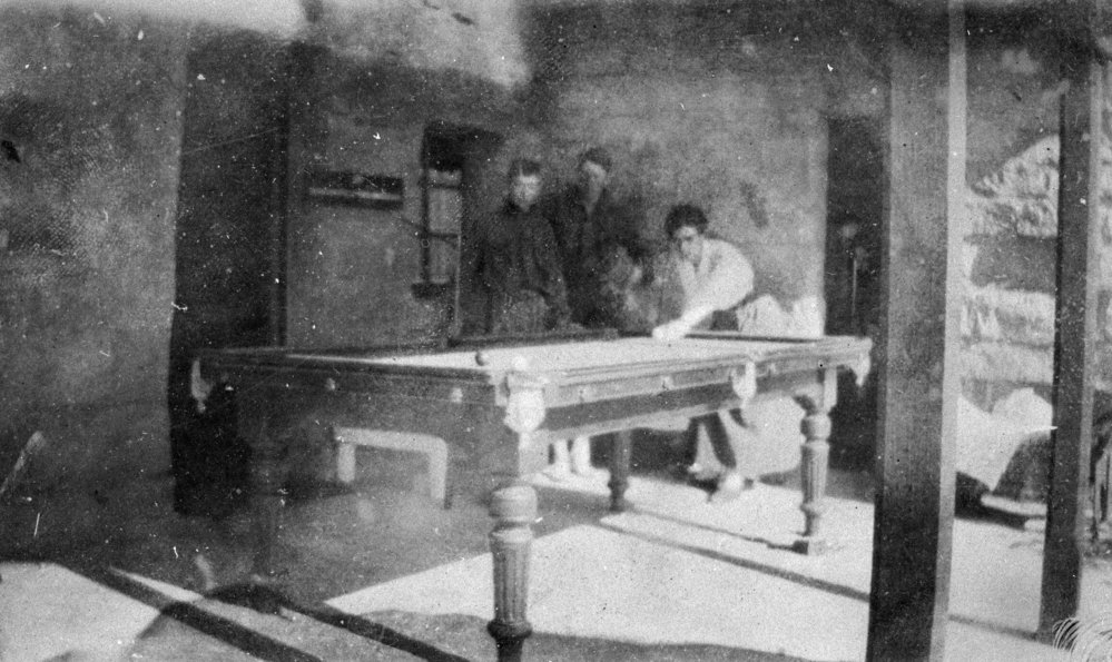 Joyce Beeby playing billiards, Newport