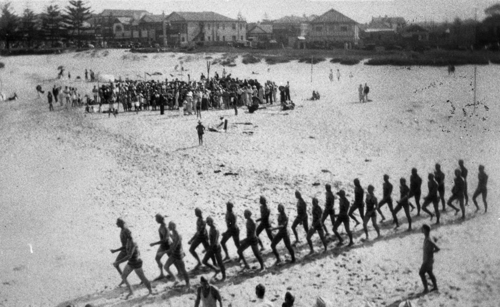 Queenscliff Surf Life Saving Club members marching