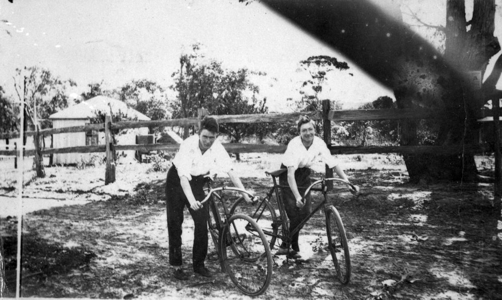 Two boys on bicycles at Mona Vale