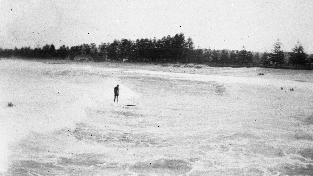 Surfing at Queenscliff Beach