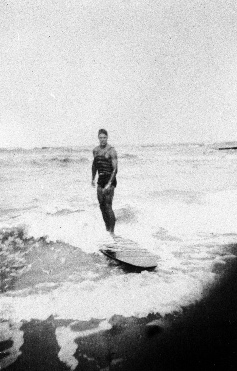 A. Blackburn surfing at Queenscliff Beach
