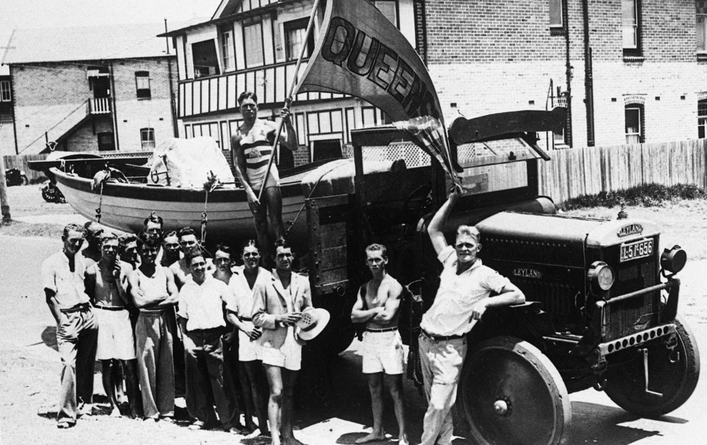 Queenscliff Surf Life Saving Club members with boat
