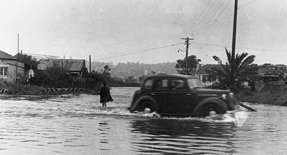 Manly Lagoon in flood at Pittwater Road Queenscliff