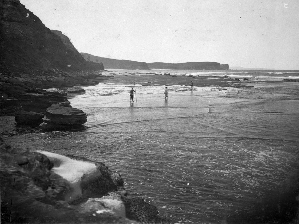 On the rocks, Bungan Beach, c 1920