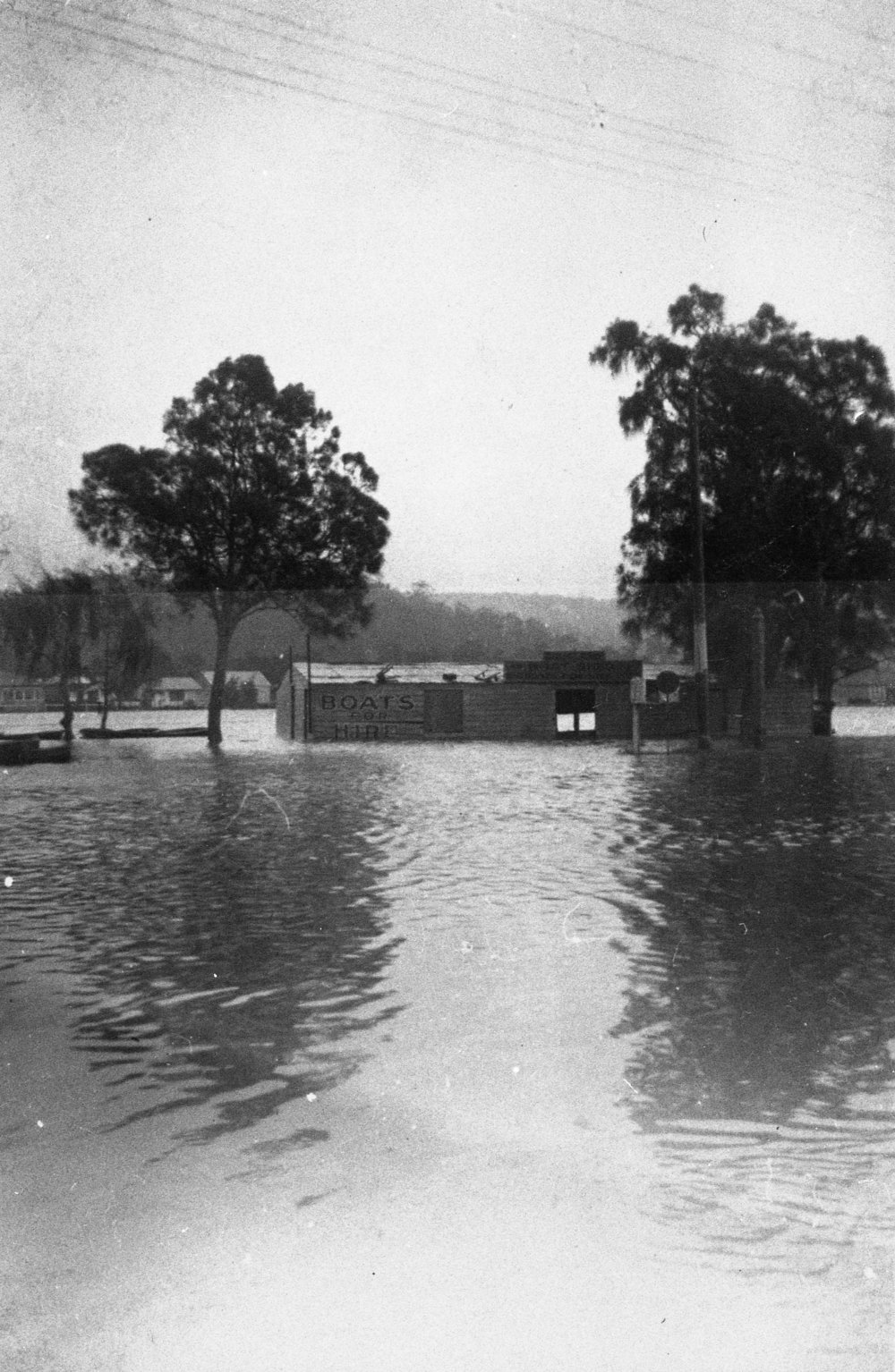 Pittwater Road and Narrabeen Lagoon in flood