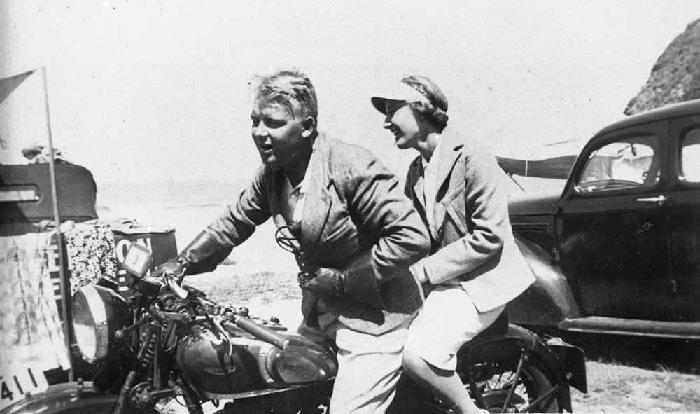 Dorothy Howes and Norman Harris, on motorbike at Bilgola Beach
