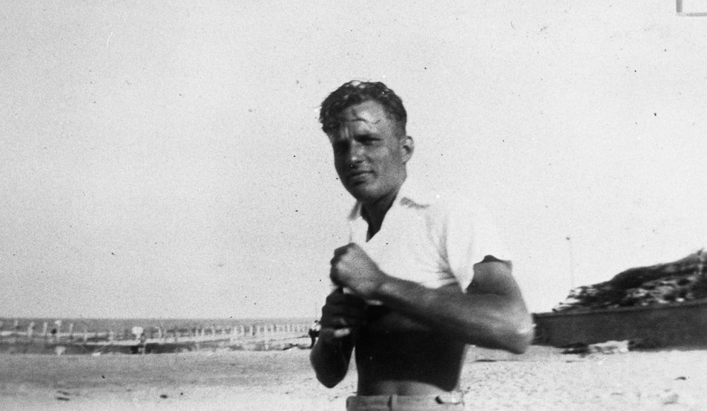 Member of Harris family on Bilgola Beach