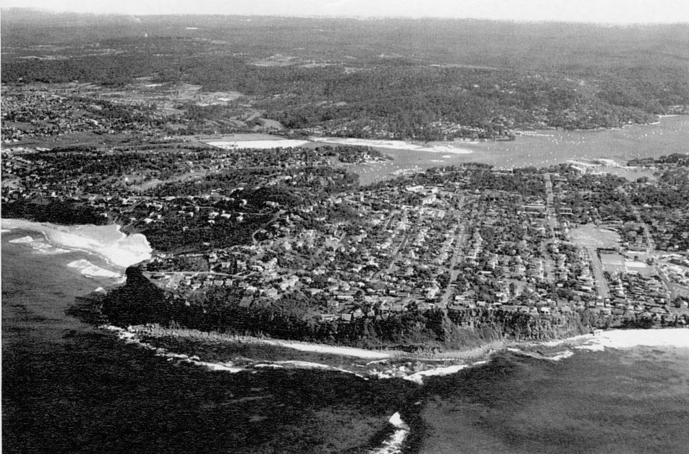 Aerial view of Bungan Head, Bungan Beach, Pittwater and Bayview beyond, 1970