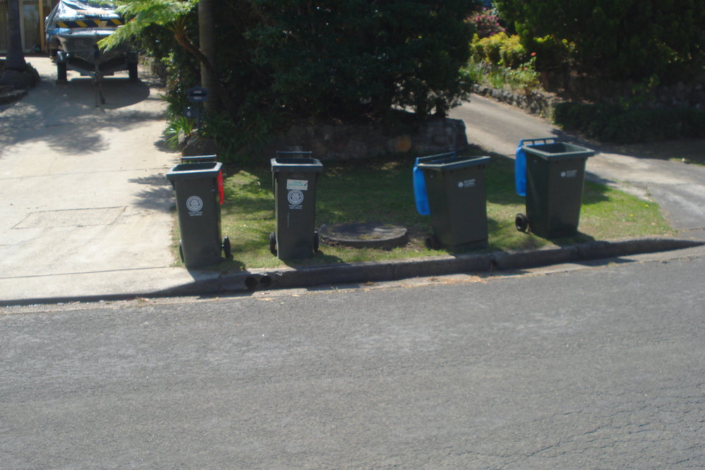 Garbage bins lined up in Koorangi Avenue, Elanora Heights