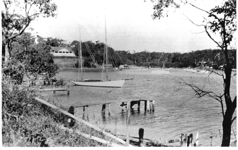 Douglas Family boatshed and part of house roof at the waterfront end of Mona Street, Mona Vale