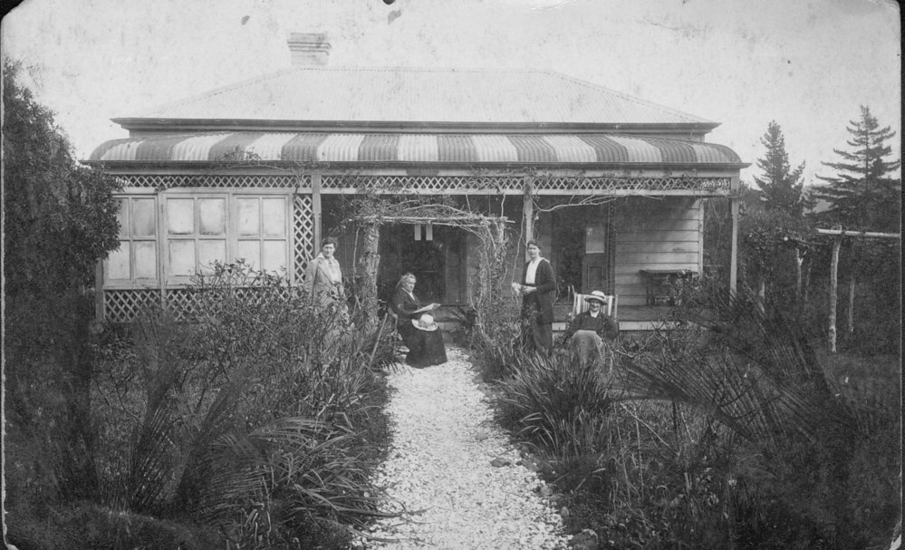 The Wyndham Family seated outside 'The Briars' cottage at Mona Vale.