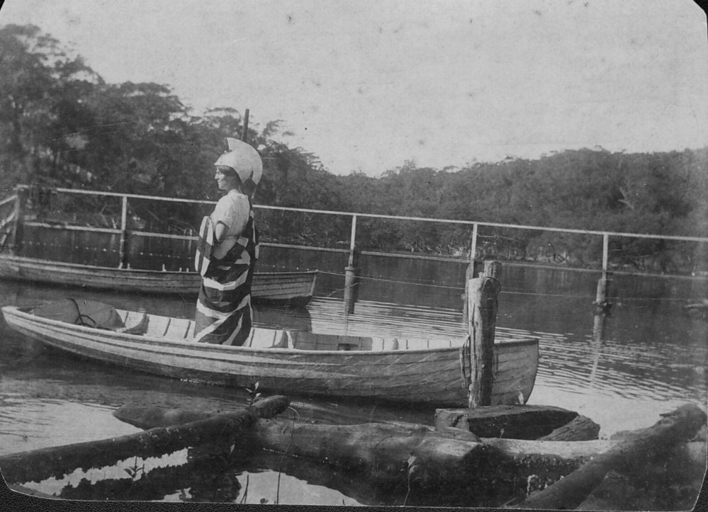 Standing in boat in fancy dress costume, Mona Vale