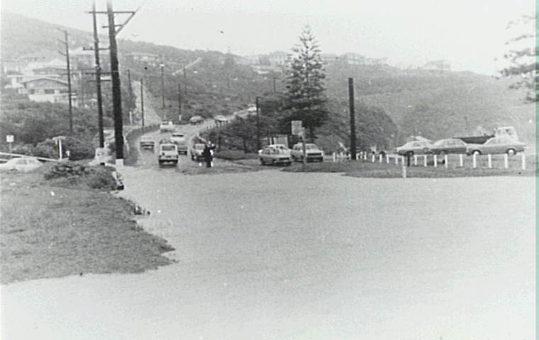 Burst water main on Barrenjoey Road, Newport, 1967
