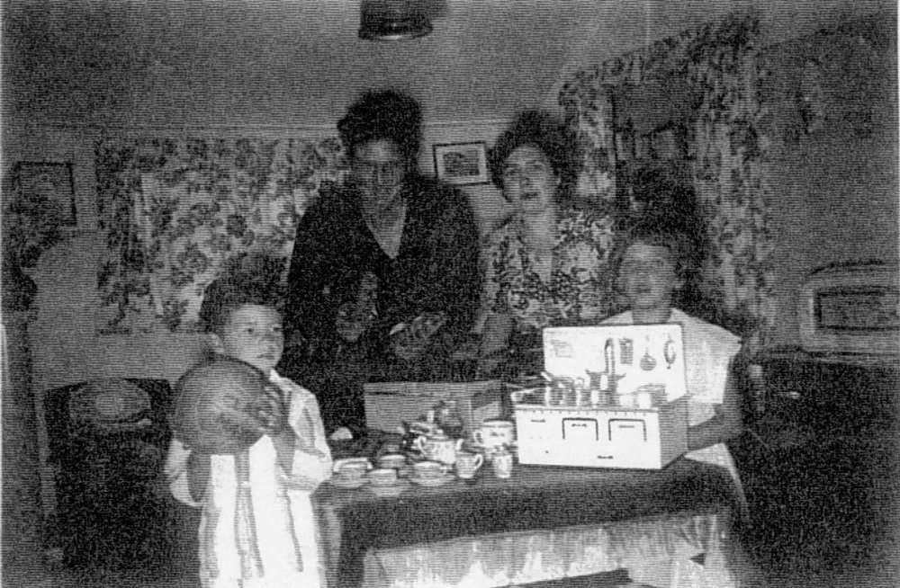 Noyen Christmas inside the Noyen Caravan tent, 1950s