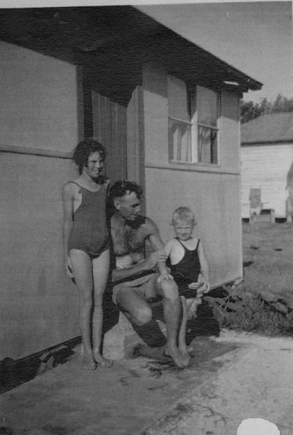 Children and father in bathing suits, North Narrabeen