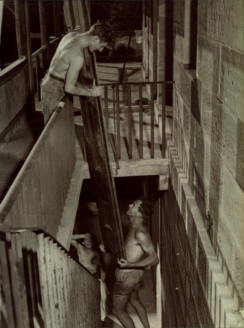Workers carrying materials up to the Barrenjoey Lighthouse