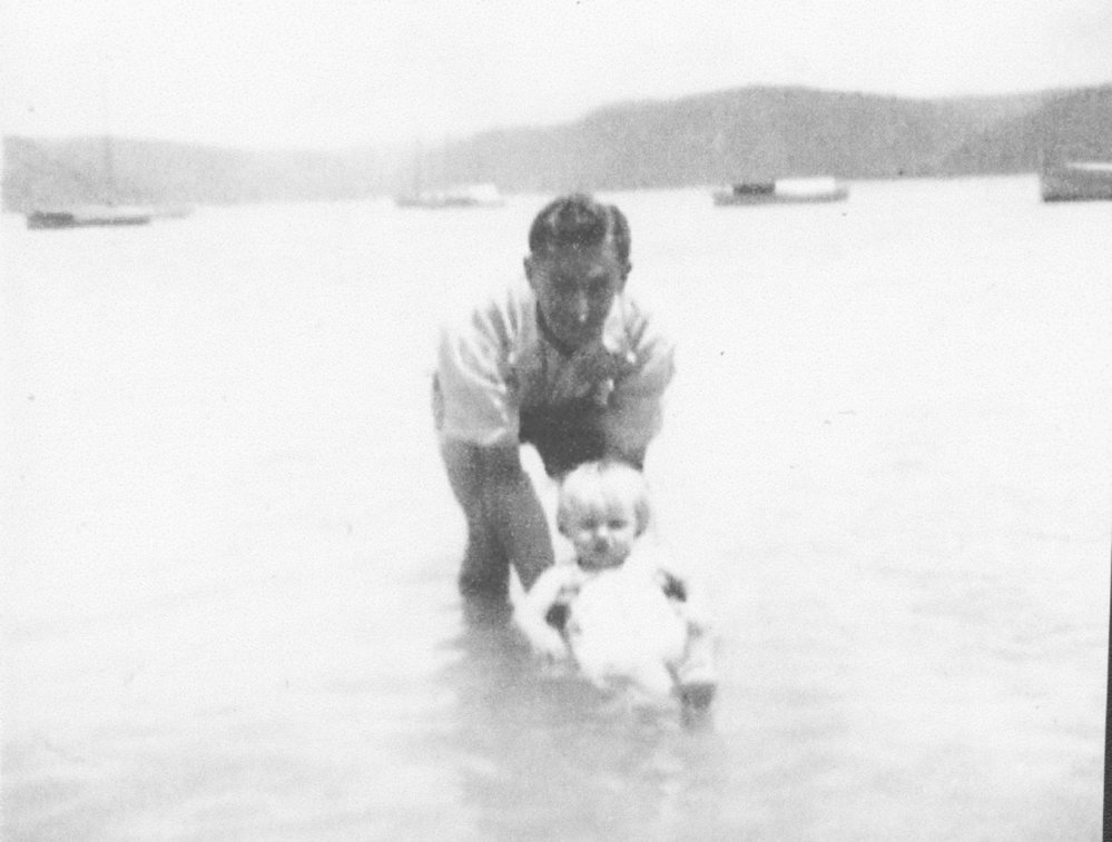 Ken Pardy in the water with daughter Robyn, 1943