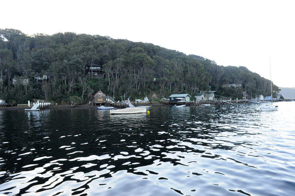 View of boats moored off Scotland Island, 2013
