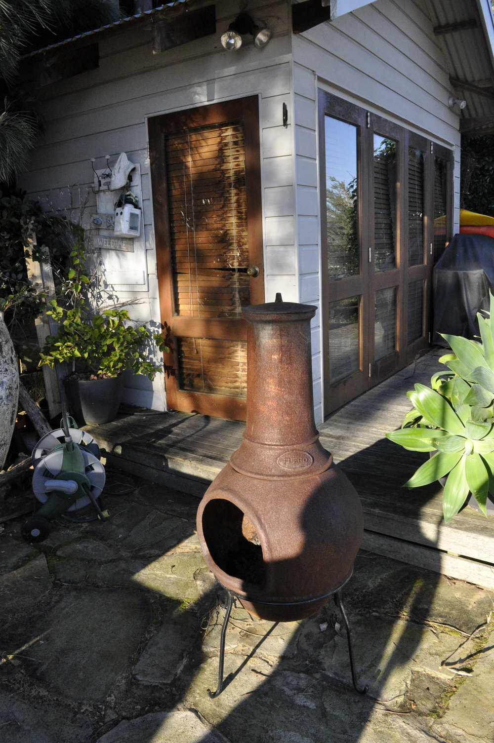 Dwelling on Scotland Island with a wood burning fire