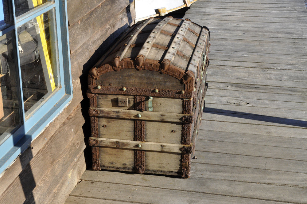 An old chest on a jetty on Scotland Island. 2013.