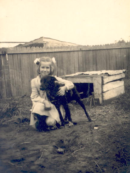 Jan Hosking with dog Toby, at 63 Pozieres Parade, Allambie