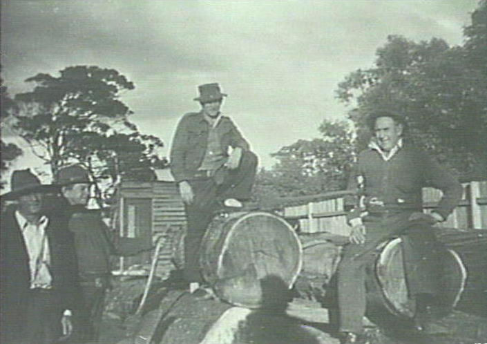 Frank and John Machon ,George James and Billy Hay at Machon's saw mill, North Narrabeen. c1930.