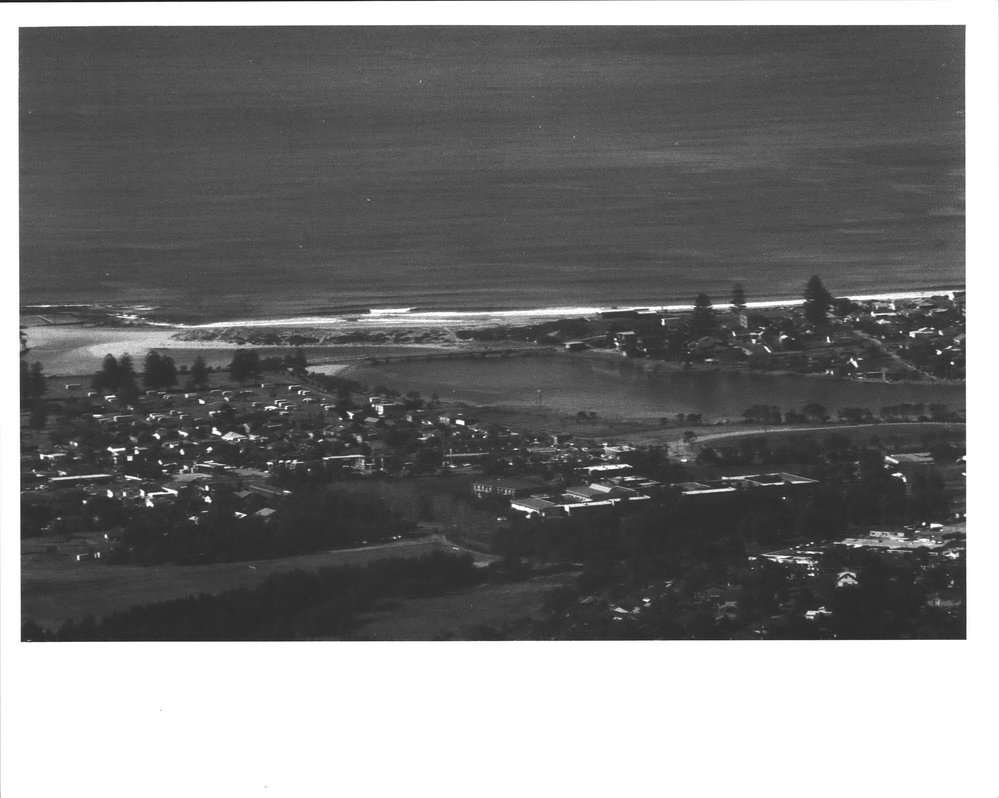 Aerial view of North Narrabeen Beach, Ocean Street Bridge and Lakeside caravan park
