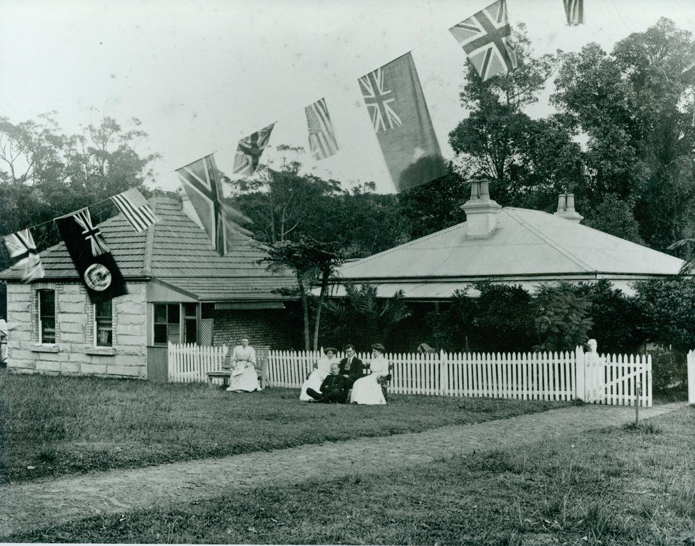 Flags outside Brookvale House to celebrate first tram to Brookvale