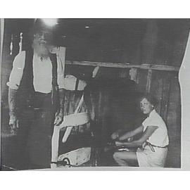 Johnny Farrell, in the bails with a young helper, Newport