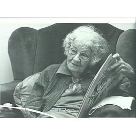 Isabel Letham, age 88, looking at her Scrap Book