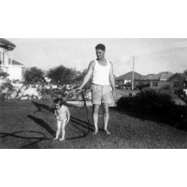 Ray Gee with daughter Debbie under the hose, 16 Jamieson Avenue, North Curl Curl