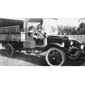 Little girls in W H Jordon fruit and vegetable truck, Brookvale