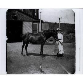Dorothy Brock with horse at La Corniche, Mona Vale