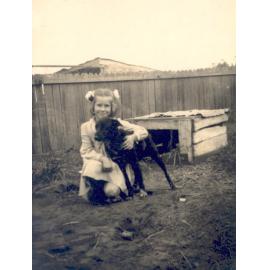 Jan Hosking with dog Toby, at 63 Pozieres Parade, Allambie