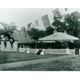 Flags outside Brookvale House to celebrate first tram to Brookvale