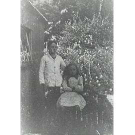 Jock and Eva Larkin in the garden of the Larkin family home, The Pines 1916