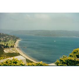 Helicopter arriving at Palm Beach with a water tank, 1995