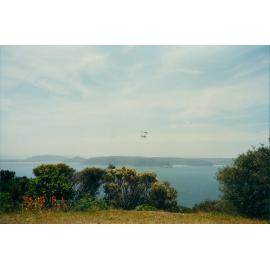 Helicopter and seaplane flying over Pittwater. 1995.