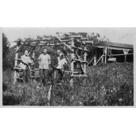 Members of the Douglas family standing in the garden of their Mona Street house, Mona Vale
