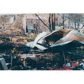 Remains of burnt houses in Kuttabul Place, Elanora Heights, 1994