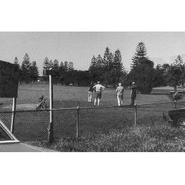 Playing golf at Palm Beach Golf Course, Palm Beach, 1975
