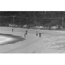 Riding motor bikes on Palm Beach, 1975