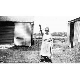 Mary Elisabeth (Lizzie) Sayce with snake on their farm Abbott Road North Curl Curl