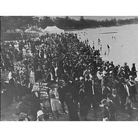 Crowds on Manly Beach, showing tents and other amusements