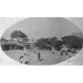 Children playing, possibly in a schoolyard