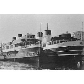 Ferry M.V. Bellubera on left beside S.S. South Steyne