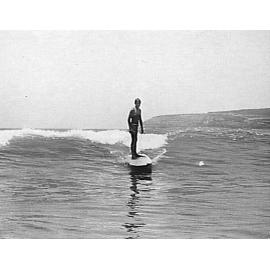 View of a young man surfing